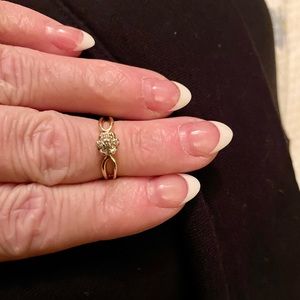 Solid 10k yellow gold and diamond ring. The diamonds are genuine.